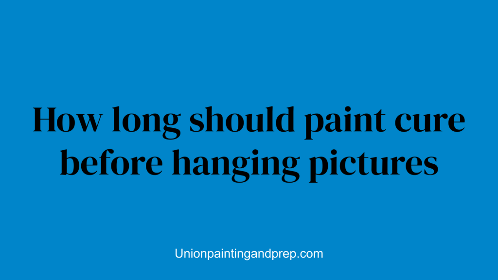 How long should paint cure before hanging pictures